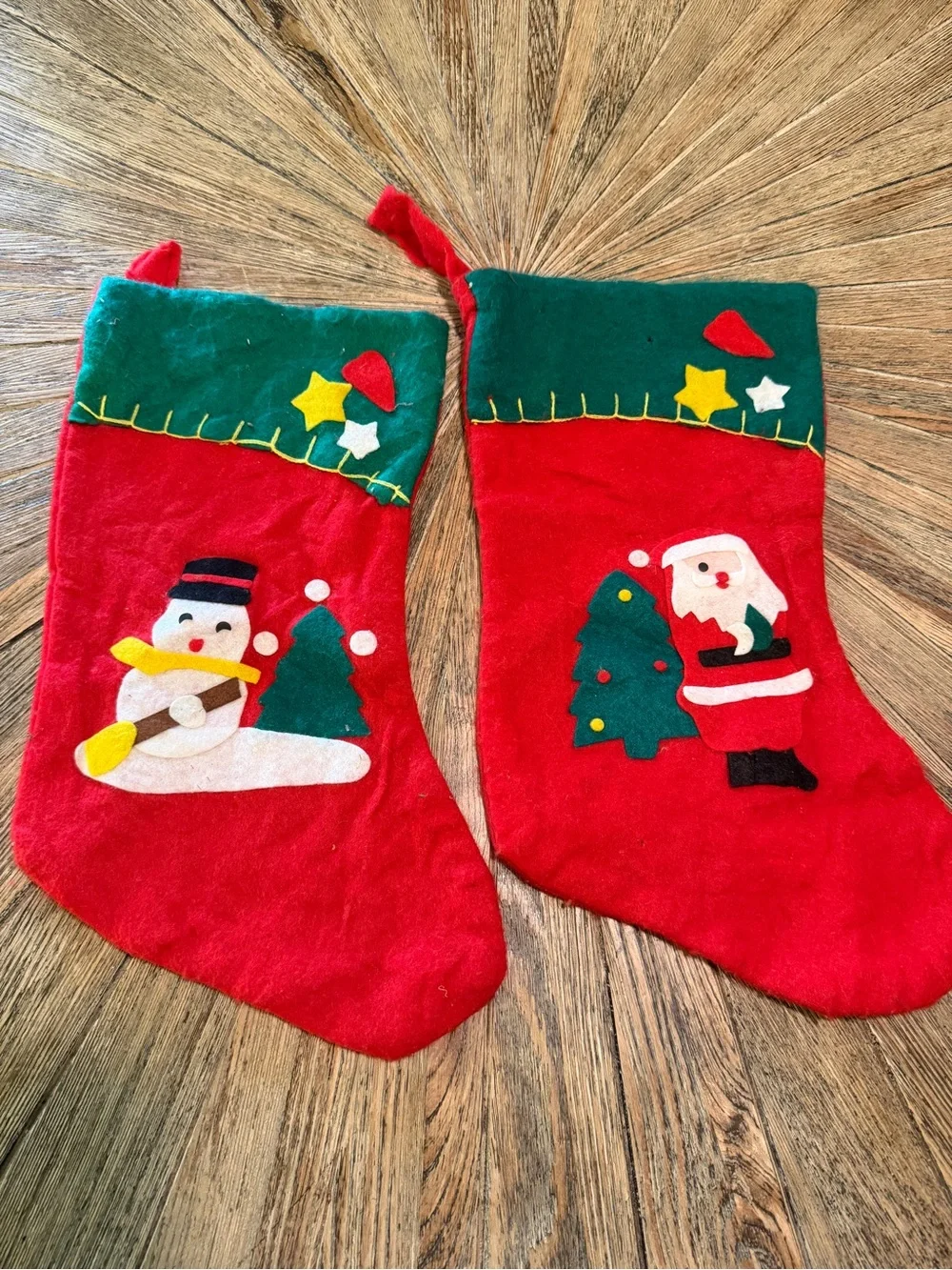 Pair of vintage felt appliqué Christmas stockings snowman and Santa